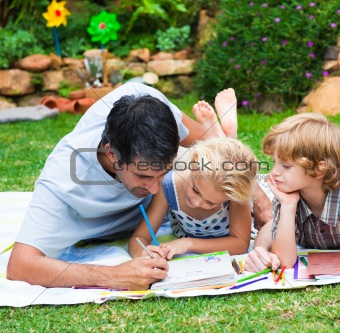 Father painting with his children