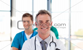 Senior doctor leading his team