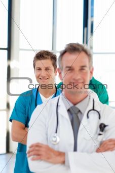 Junior doctor in focus in a line