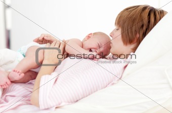 Woman holding her newborn baby