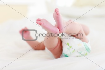 Baby lying in bed