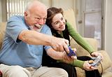 Grandpa and Teen Play Video Games