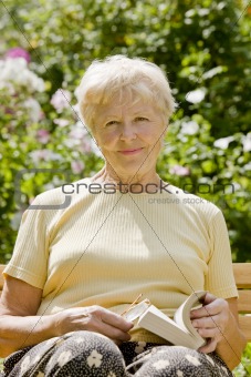 The elderly woman with the book