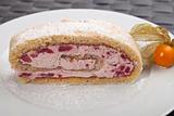 slice of a jelly roll cake on a white plate