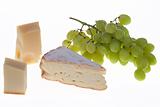 different kinds of cheese and grapes