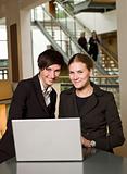 Businesswomen in front of a laptop
