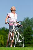Cyclist girl enjoing the sun