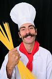 Chef smiling and holding spaghetti