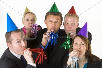 Group Of Business People Wearing Party Favors