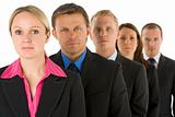 Group Of Business People In A Line Looking Serious 