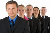 Group Of Business People In A Line Looking Serious 