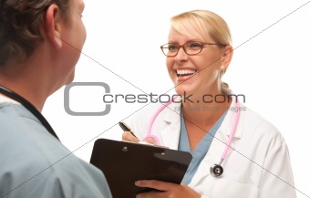 Male and Female Doctors Talking Over File.