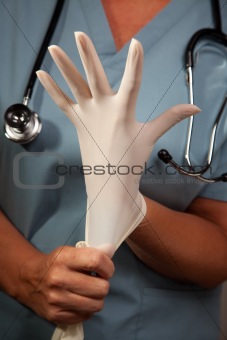 Abstract Image of Doctor Putting on Latex Surgical Gloves.
