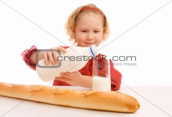Girl pouring milk 