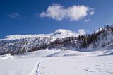 snowy alpine lake and village