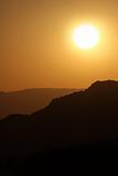 Vertical Silhouette Sunrise of Hazy Misty Mountains
