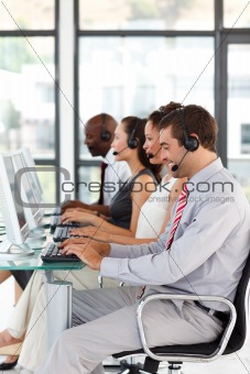 Young businessman working in a call center