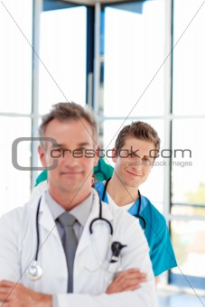 Young doctor in focus in a line