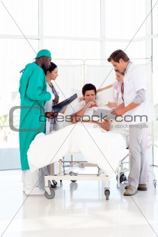 Doctors speaking to a patient