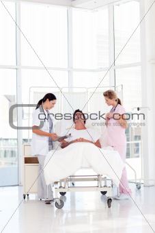 Female doctor speaking to her patient