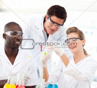Portrait of a scientists examining test-tubes