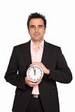 Businessman hold a big clock