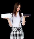 Schoolgirl with books in hands
