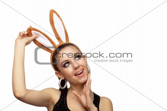Young playful woman with bunny ears