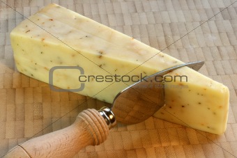 Cheese Wedge on Cutting Board
