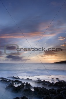 sunset of coral reef coastline