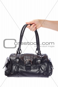 Holding a handbag