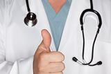 Male Doctor With Thumbs Up and Stethoscope.