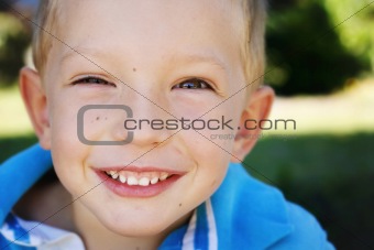 Close-up portrait of a happy young boy.
