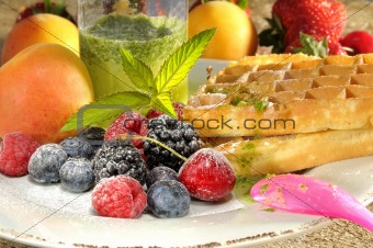 Waffles with peppermint and fruits