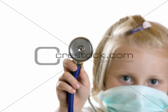 Little child dressed as doctor