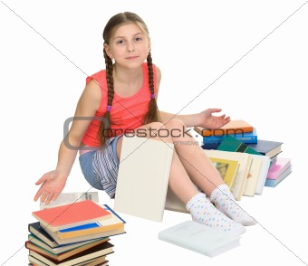 Schoolgirl among a heap of books