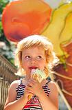 girl enjoys an ice-cream