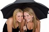 Two Beautiful Young Women Under An Umbrella