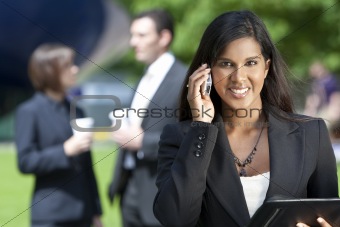 Young Asian Businesswoman On Her Cell Phone