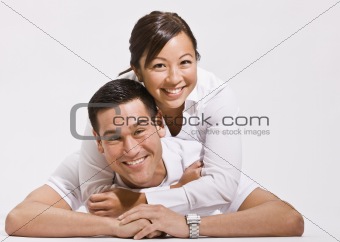 Attractive Young Couple Posing on Floor
