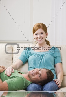Couple Relaxing on Couch Together.