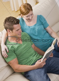 Attractive Couple Reading Together