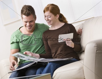 Couple Looking at a Photo Album Together