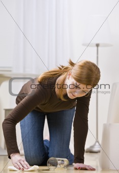 Woman Cleaning Spill