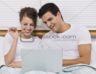 Couple Viewing Laptop