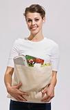 Attractive Brunette Holding Grocery Bag