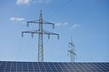 solar panels and a pylon on a sunny day