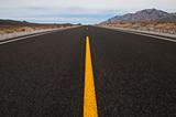 straight road vanishing into distance