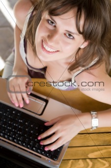 Beautiful women working at notebook