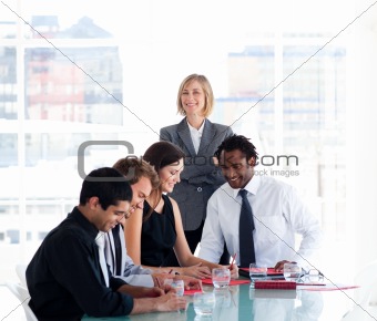 Female manager with her team in a meeting